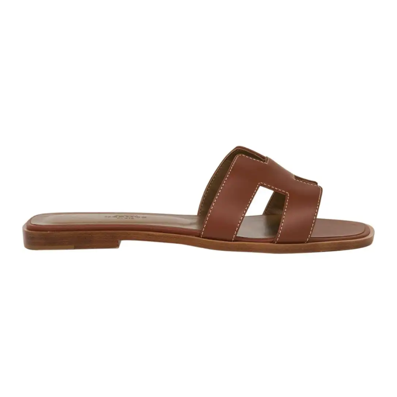 Untitled-design-2025-02-25T005753.551 Hermes Sandal Flat Oran Gold Box Calfskin | Mightychic - Image 1